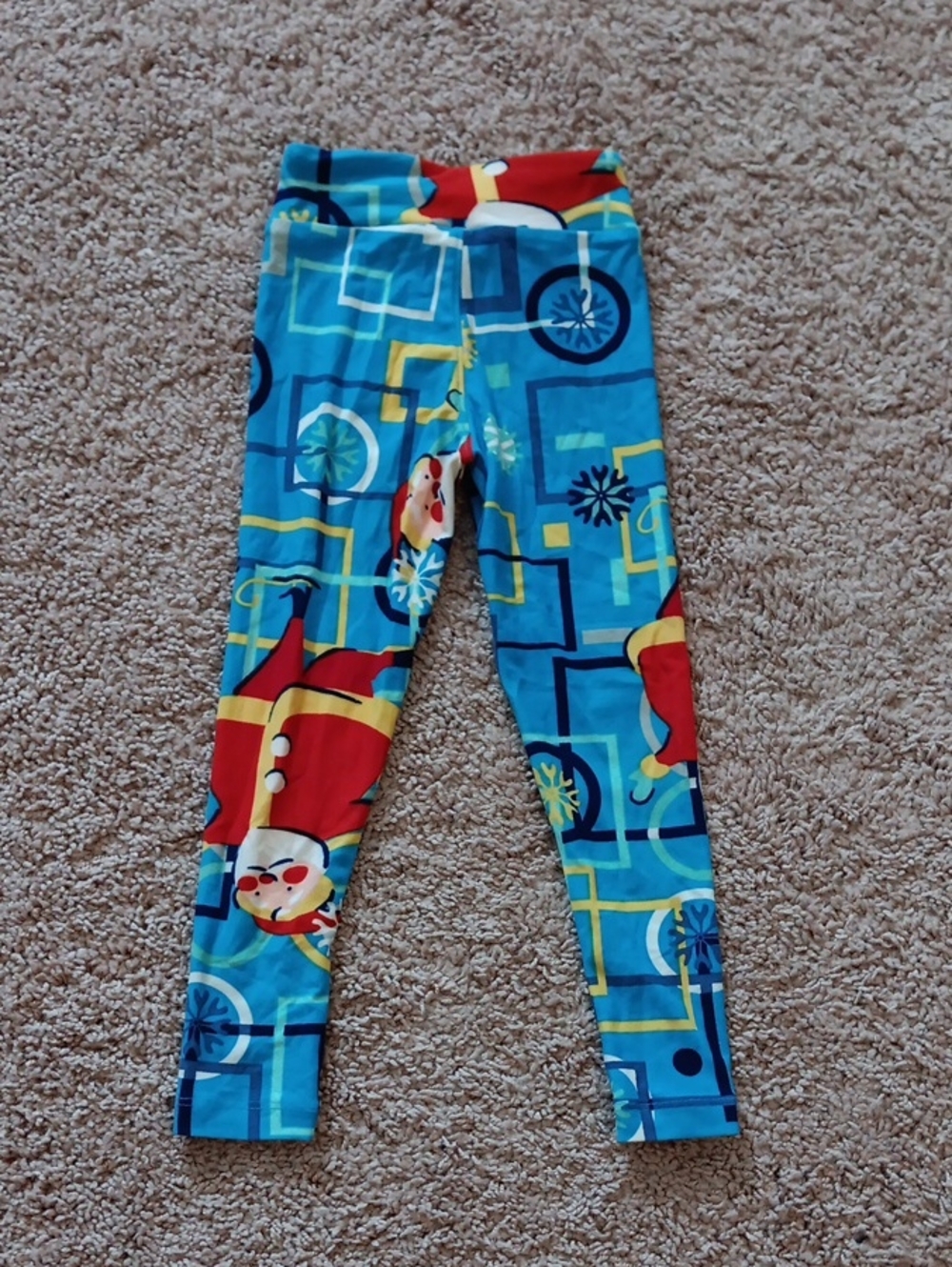 LuLaRoe Blue Leggings with Red and Yellow Holiday Characters